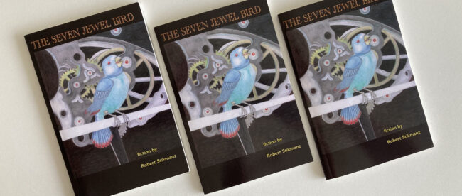 A row of three copies of a paperback book